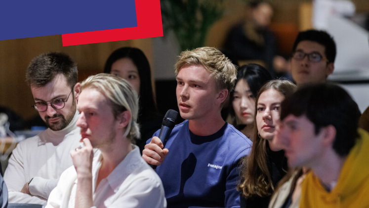 A man asks a question at an event